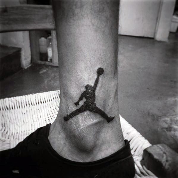 Mens Black Ink Jordan Symbol Tattoo On Ankle Of Leg