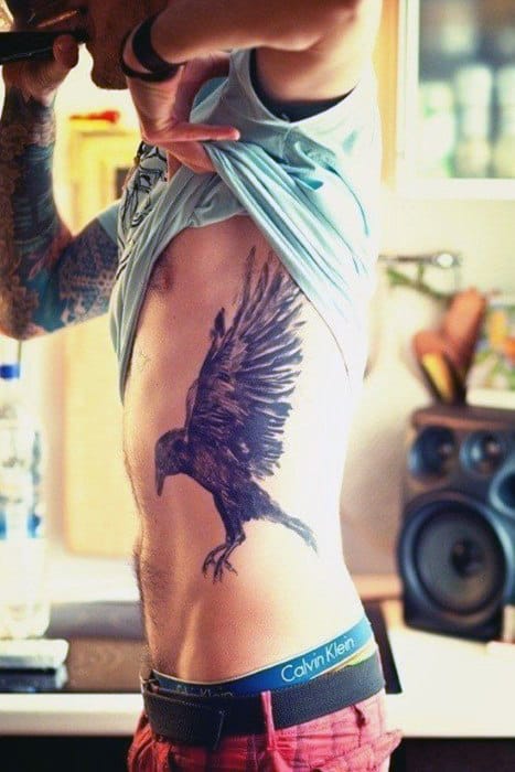 Mens Black Raven With Thick Feathers Tattoo On Ribs