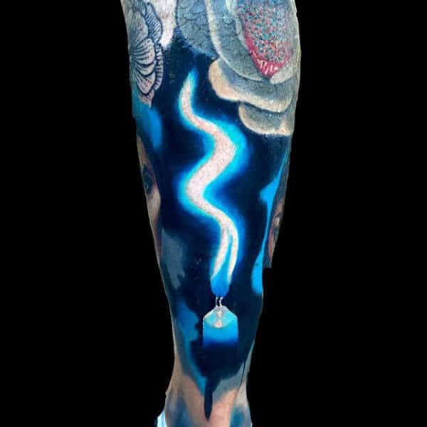 Mens Blue Flame Tattoo On Legs