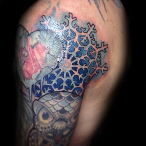 Mens Blue Ink Snowflake Negative Space Shoulder And Upper Arm Tattoo
