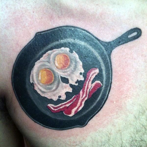 Mens Chest Bacon And Omellete Tattoo