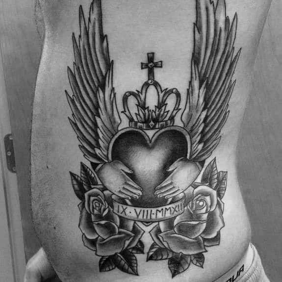 Mens Claddagh Tattoo On Rib Cage Side Of Body With Wings
