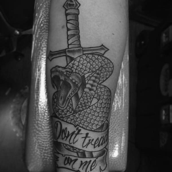 Mens Coiled Snake And Knife With Dont Tread On Me Text Forearm Tattoo