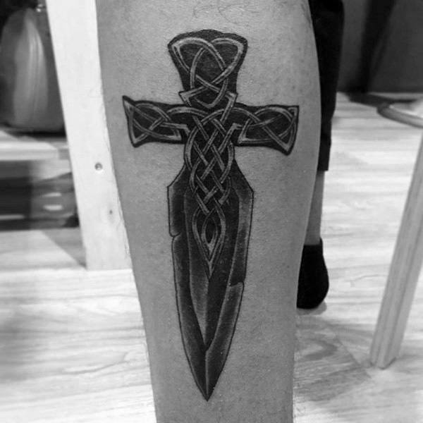 Mens Creative Celtic Cross With Dagger Shape Leg Tattoo