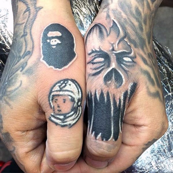 Mens Demon Thumb Tattoo Designs