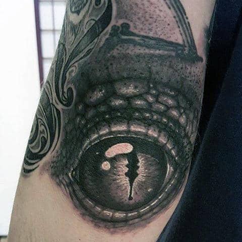 Mens Elbow Tattoo Of Dragon Eye