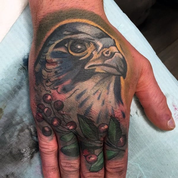 Mens Falcon Hand Tattoo Designs