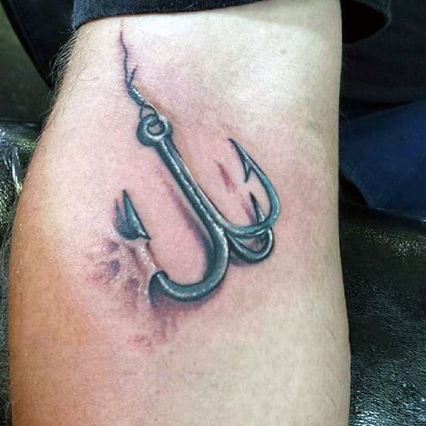 Mens Fish Hook Catching Skin Tattoo On Arm