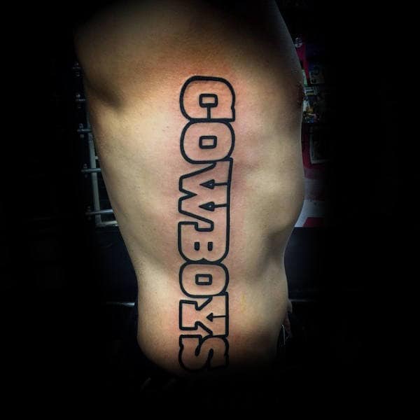 Mens Football Nfl Cowboys Lettering Tattoo On Rib Cage Side Of Body