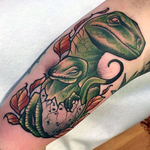 Mens Forearms Green Dinosaur And Baby Tattoo