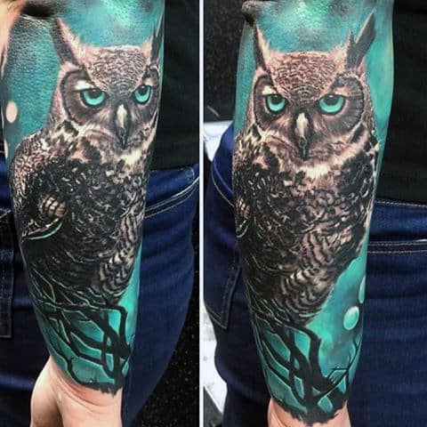 Mens Forearms Realistic Owl In Green Background Tattoo