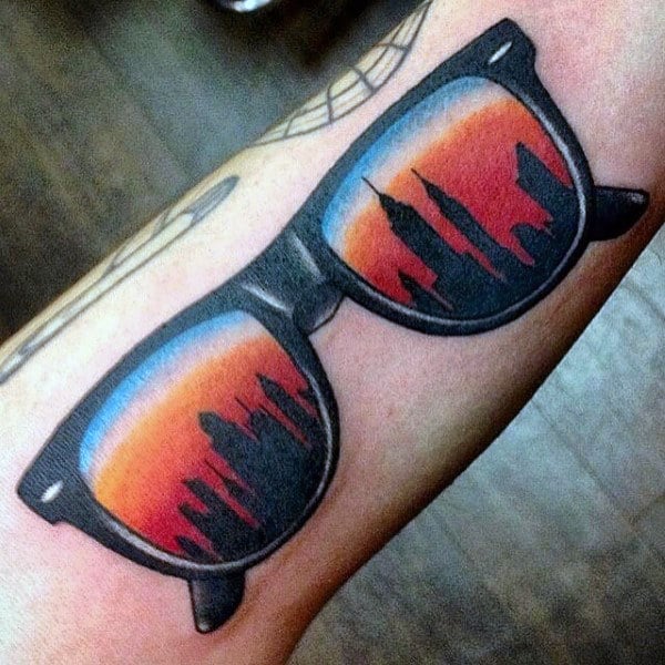 Mens Glasses With Skyline And Sunset Tattoo On Forearm