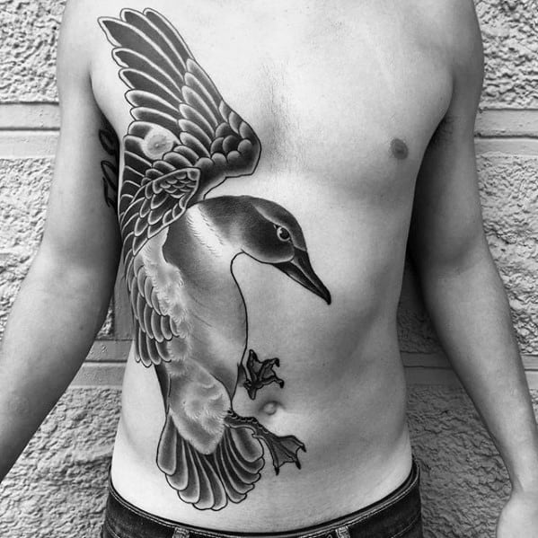 Mens Incredible Tattoo Flying Bird Rib Cage Side And Chest Design Ideas