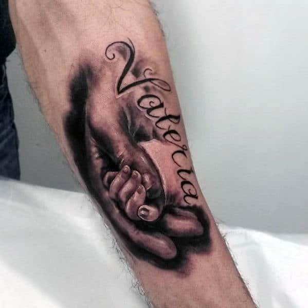 mens kids name hands holding inner forearm tattoo designs
