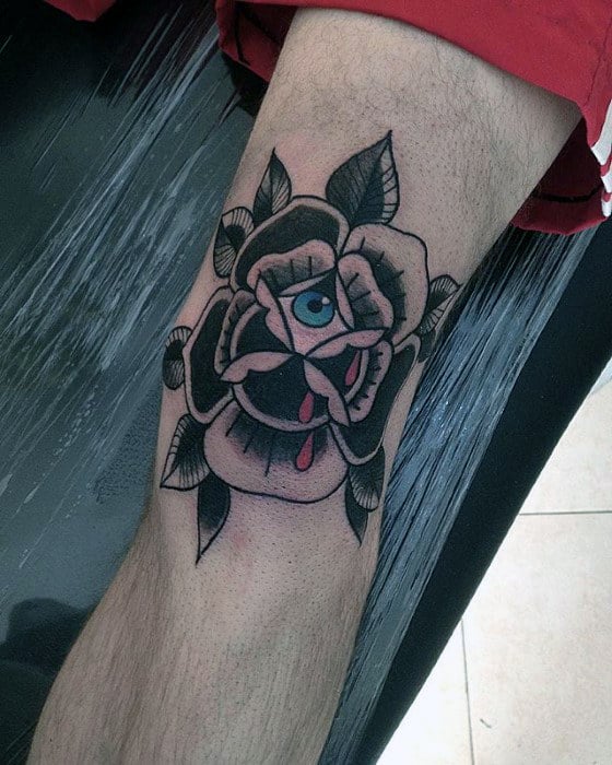 Mens Knee Black Flower With Eye Traditional Tattoo