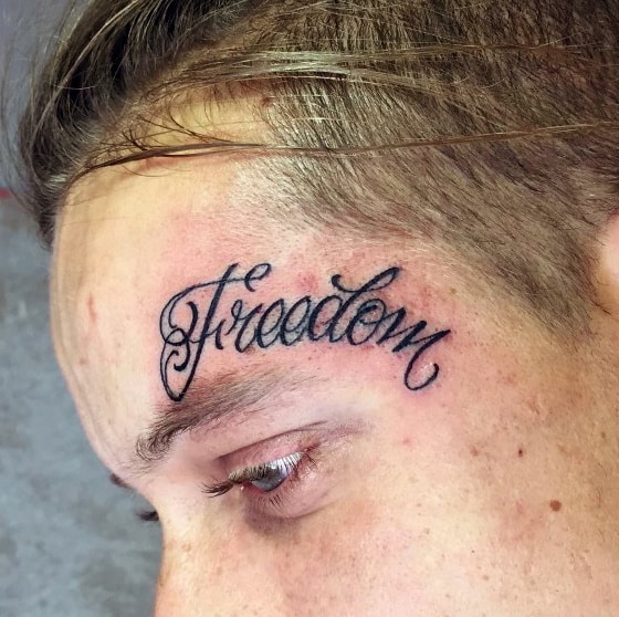 Mens Lettering Freedom Word Face Tattoos Above Eyebrow