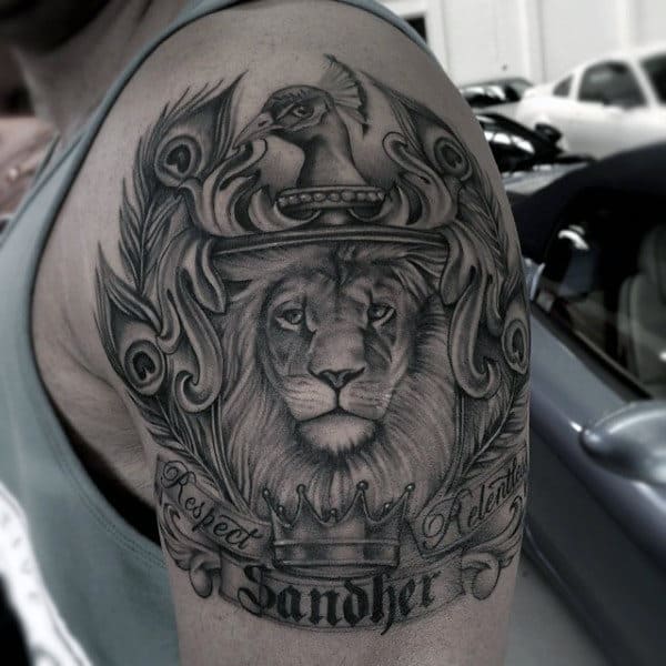 Mens Lion And Crown Family Crest Tattoo Design On Upper Arm