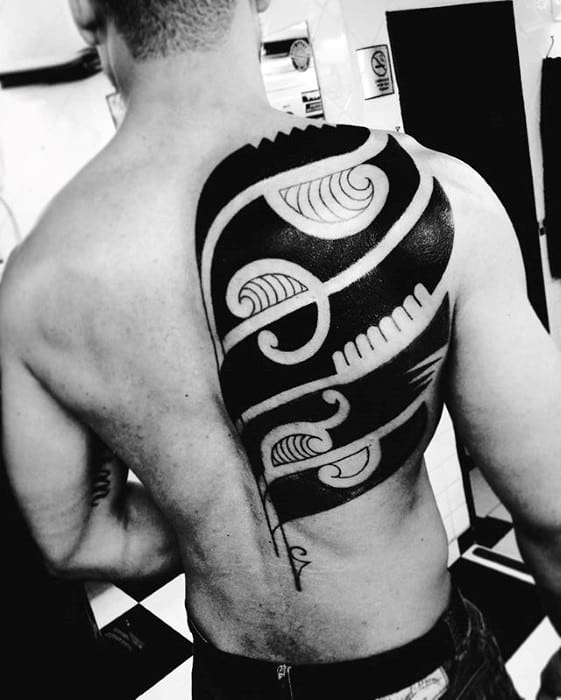 Mens Negative Space Blackwork Sick Half Back Tattoo With Tribal Design