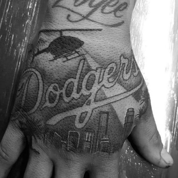 Mens Negative Space Hand Dodgers Tattoo Design Inspiration