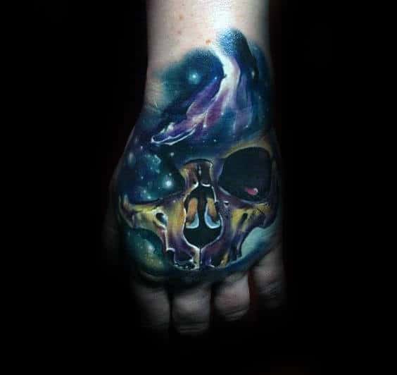 mens-outer-space-skull-hand-tattoo-designs