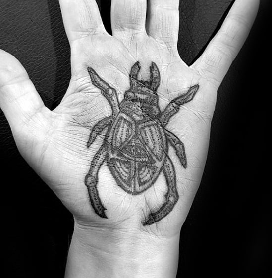 mens palm scarab bettle tattoos