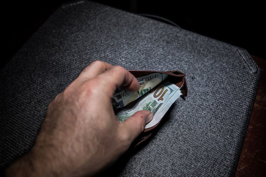 men's purse with money 