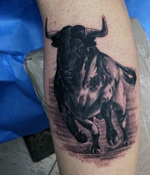 Men's Running Bull Tattoo On Calf