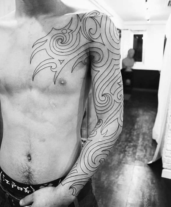 Mens Sick Tribal Tattoo On Arm And Chest With Black Ink Outline Design