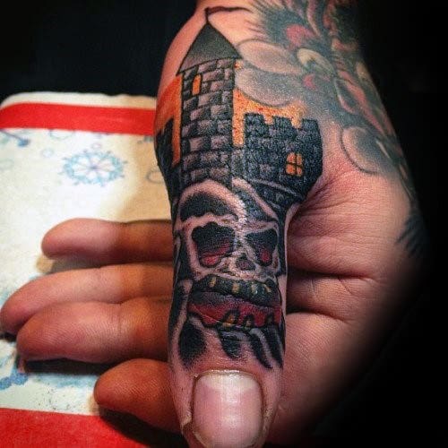 Mens Skull With Castle Thumb Tattoos