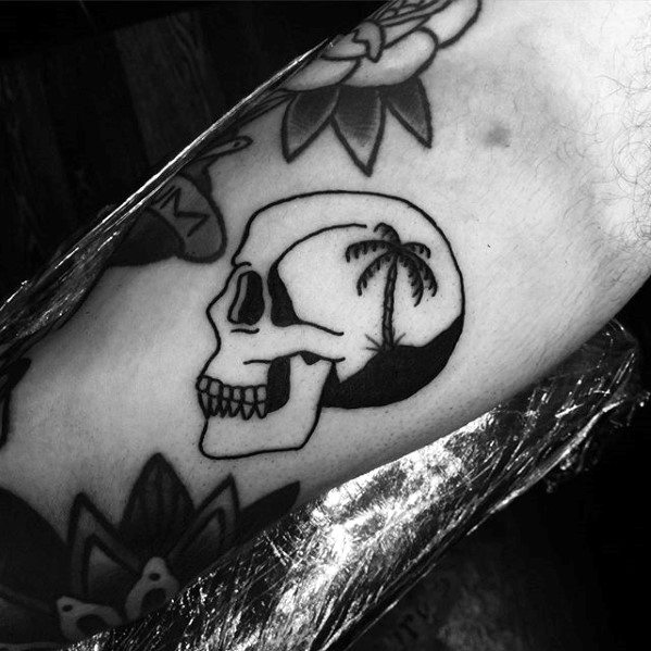 mens-skull-with-palm-tree-simple-arm-tattoo