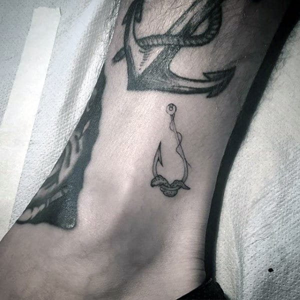 Mens Small Simple Worm Fish Hook Tattoo On Leg