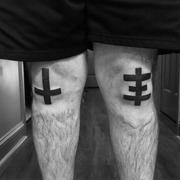 Mens Solid Black Ink Cross Knee Tattoo