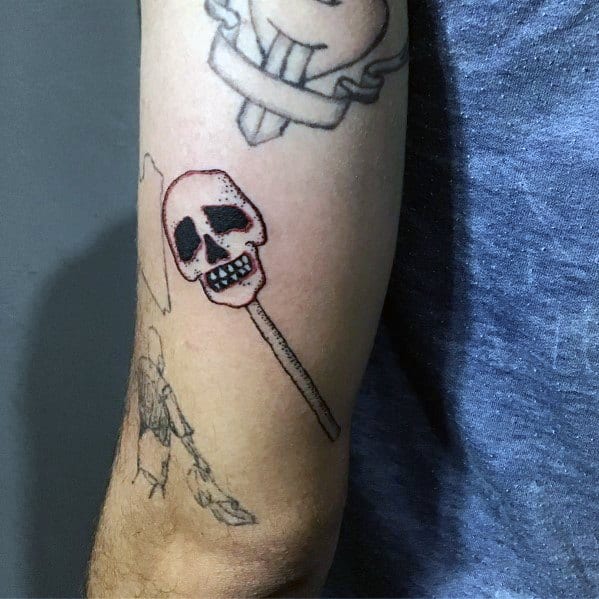 Mens Tattoo Designs Candy Themed Skull Lollipop