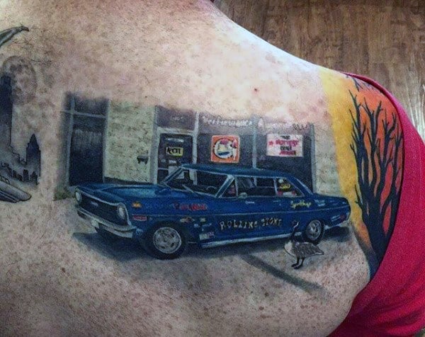 Men's Tattoo Of Old School Cars In Blue