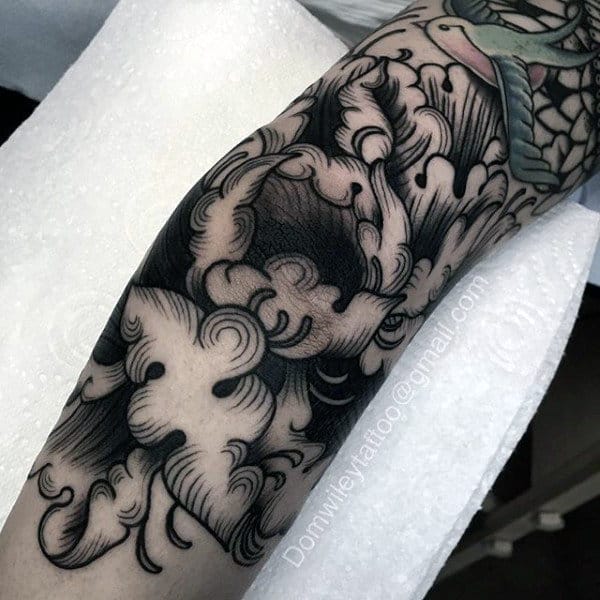 Mens Tattoo On Elbow In Black Ink