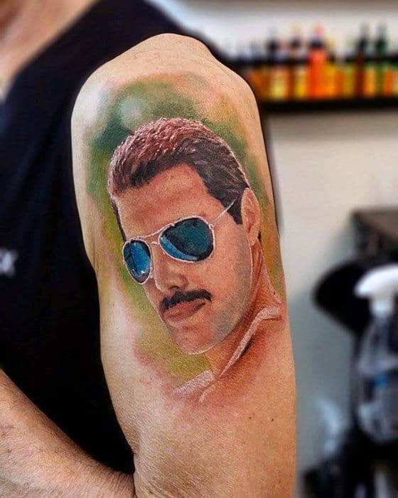 Mens Tattoo On Upper Arm With Freddie Mercury Queen Rock Band Design