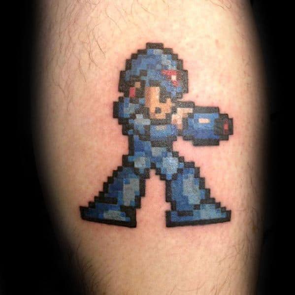 Mens Tattoo With Megaman Design On Leg