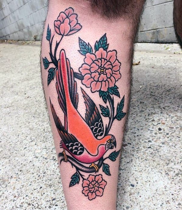 Mens Tattoo With Parrot Design On Leg With Floral Design