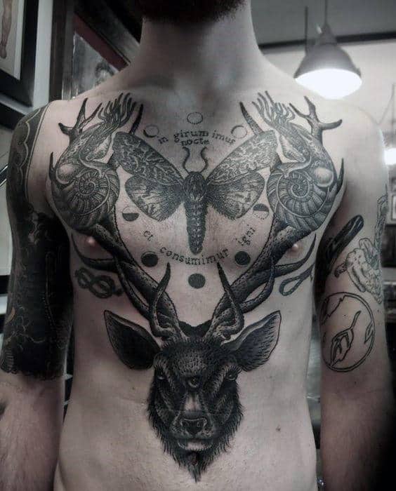Mens Torso Black And Grey Long Horned Beast And Dragonfly Tattoo