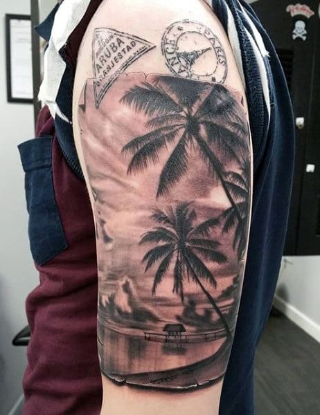 Mens Traveling Stamps Beach Tattoo Design On Arm