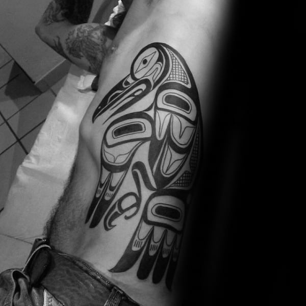 Mens Tribal Tattoo Of Haida Bird On Ribs