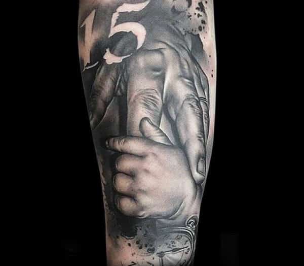 Mens Upper Arms Heart Touching Family Tattoo Of Baby Clutching Hand