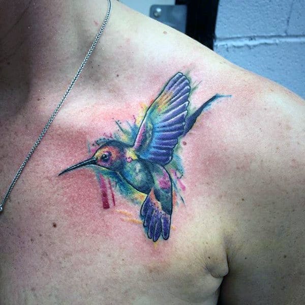 mens watercolor hummingbird tattoo on upper chest