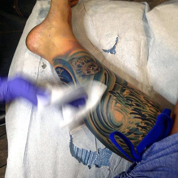 Men's Wave Tattoo Sleeve On Legs