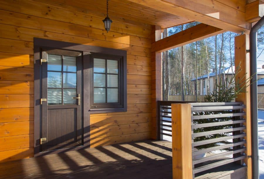 wood deck with metal railing porch 