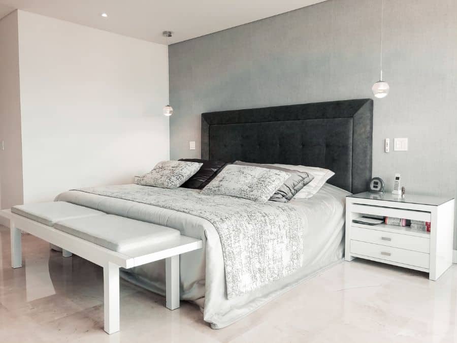 minimalist gray bedroom low hanging lights