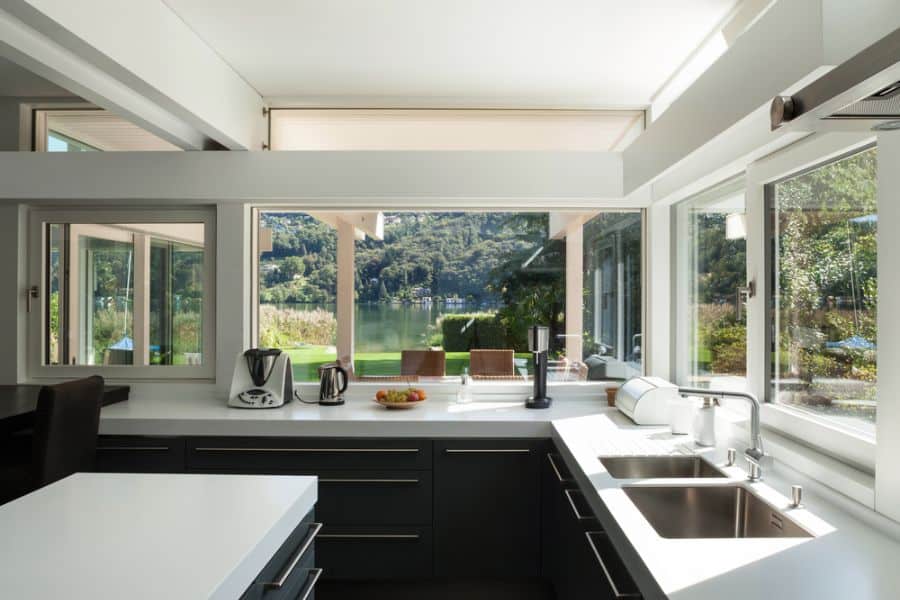 simple black and white kitchen lots of windows 