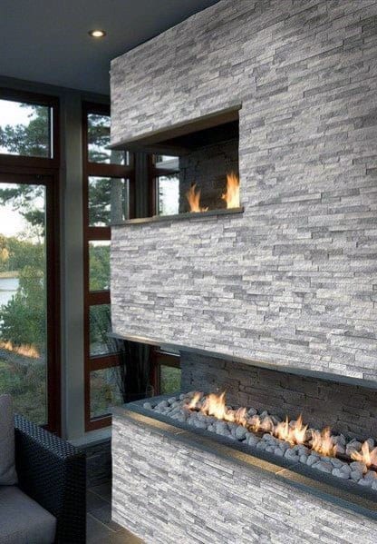 two-tiered stacked stone fireplace 