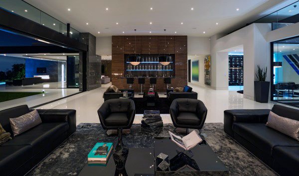 modern formal luxury living room black sofa and lounge chairs wood bar
