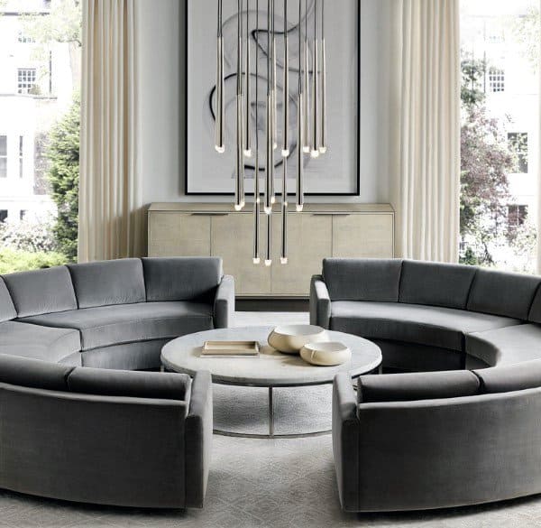 modern formal living room gray circular sofa chandelier